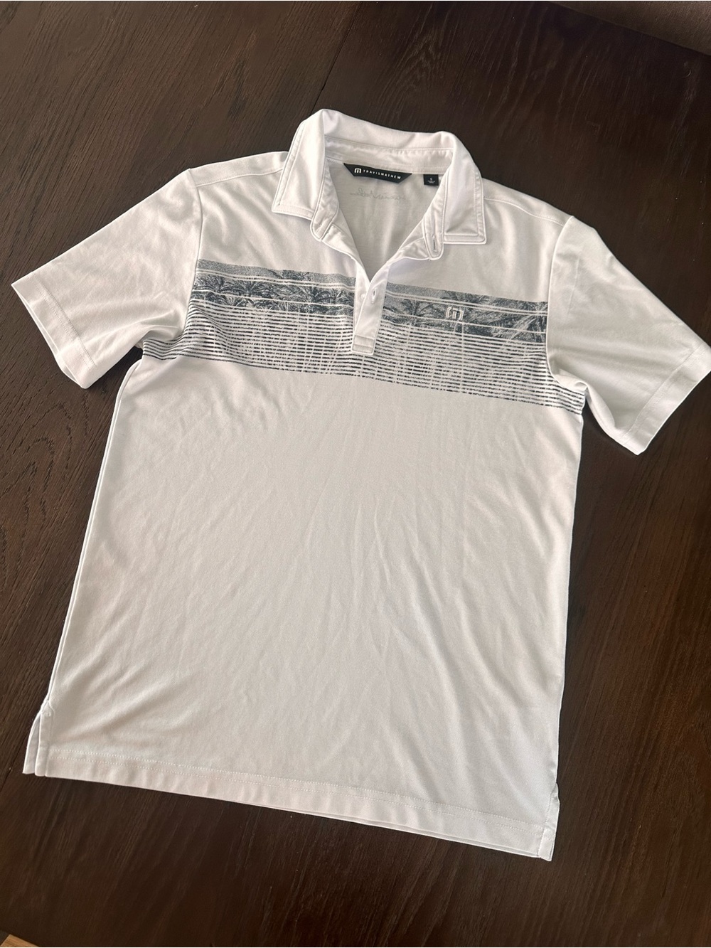 Travis Mathew White Polo with Grey Striped Chest Panel